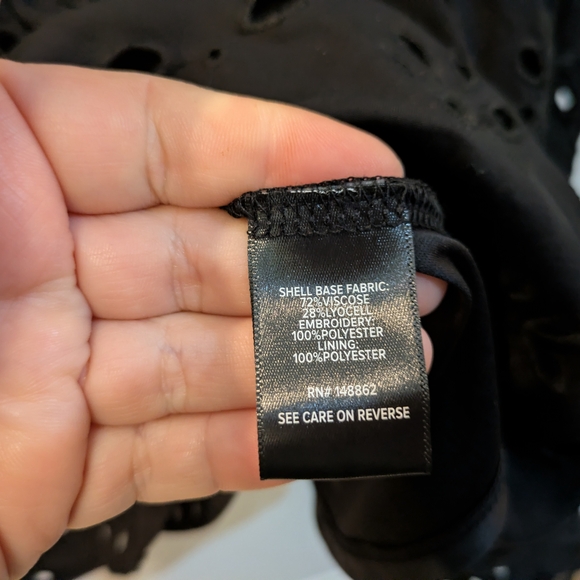 New with tags! Torrid Black Eyelet Puff-Sleeve Top - Picture 7 of 14